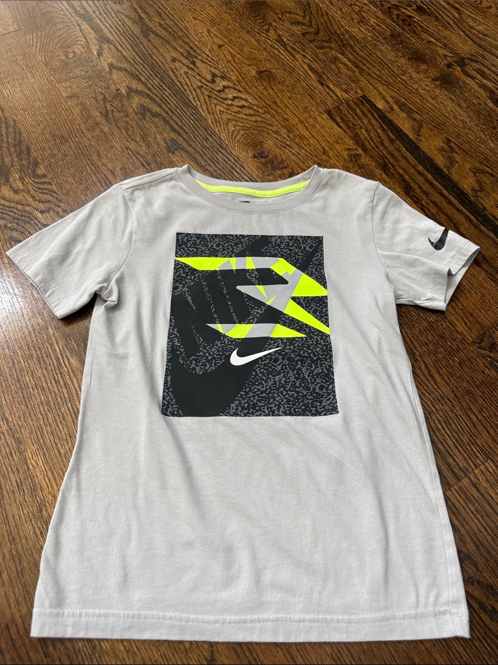 Nike Kids Light Gray Graphic Tee with Neon Yellow Accents